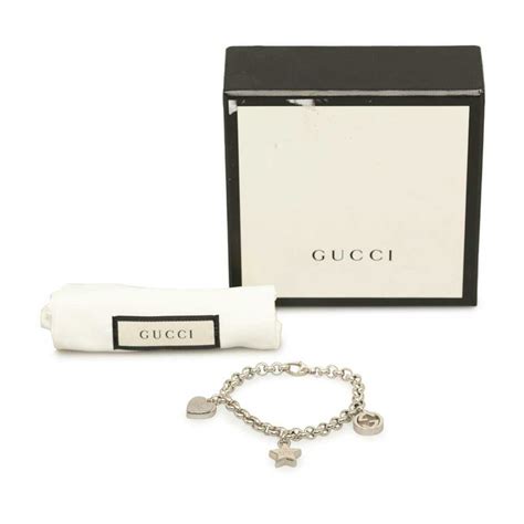 gucci heart pendant bracelet|Gucci interlocking g silver bracelet.